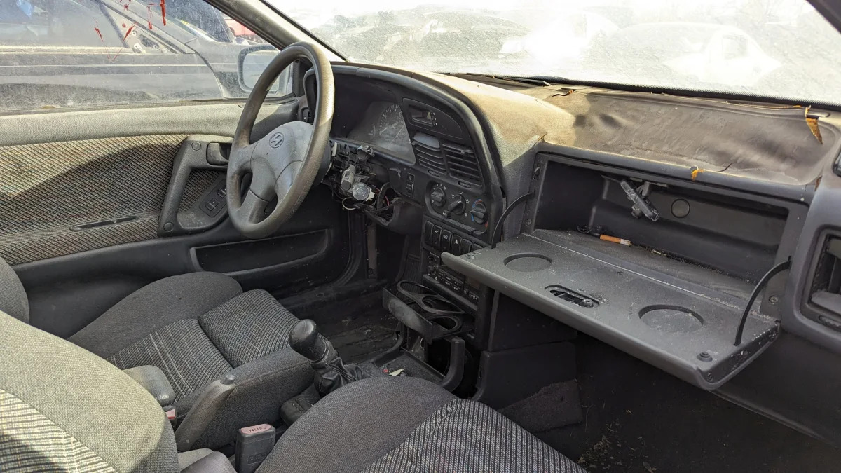 40 - 1993 Hyundai Scoupe in Colorado junkyard - photo by Murilee Martin