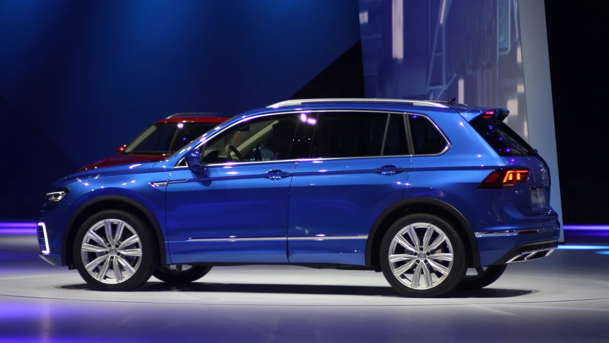The Volkswagen Tiguan GTE concept unveiled at Volkswagen's Group Night ahead of the 2015 Frankfurt Motor Show, near rear three-quarter view.