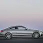 The 2016 Mercedes C-Class Coupe, side view in silver.