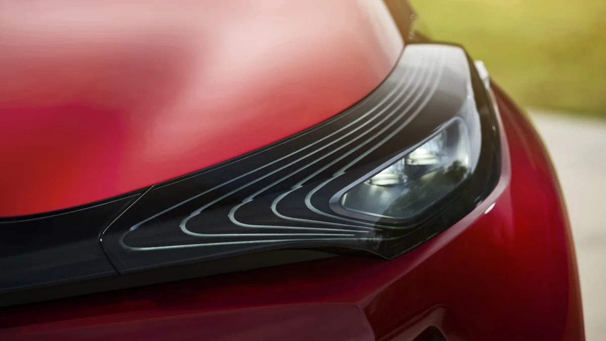 The Scion C-HR concept shown off in red for the LA Auto Show, headlight detail.