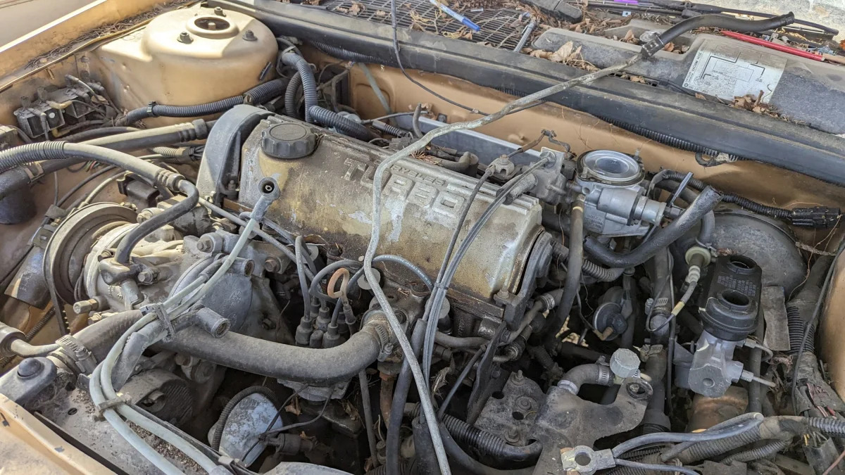 53 - 1985 Dodge Daytona Turbo in Colorado junkyard - photo by Murilee Martin