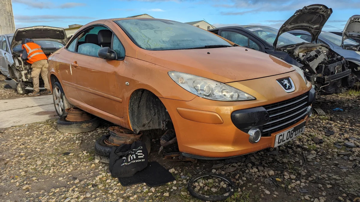 24 - 2006 Peugeot 307CC in British wrecking yard - photo by Murilee Martin