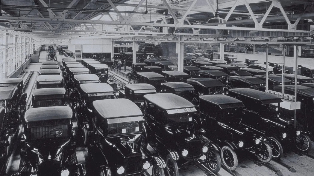 NEW FORD MOTORCARS GROUPED IN WAREHOUSE, 1925.