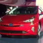 2016 Toyota Prius red, at reveal event, front 3/4