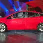 2016 Toyota Prius red, at reveal event, side profile