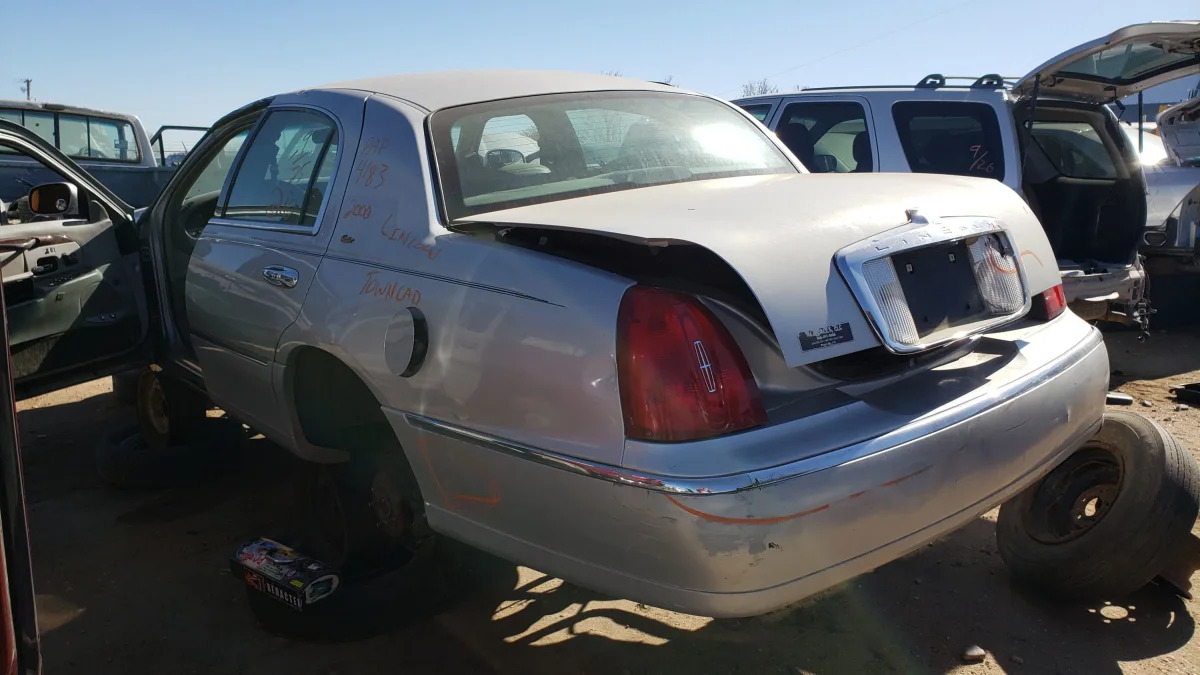 32 - 2000 Lincoln Town Car Cartier Edition in Colorado junkyard - photo by Murilee Martin