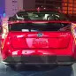 2016 Toyota Prius red, at reveal event, rear view