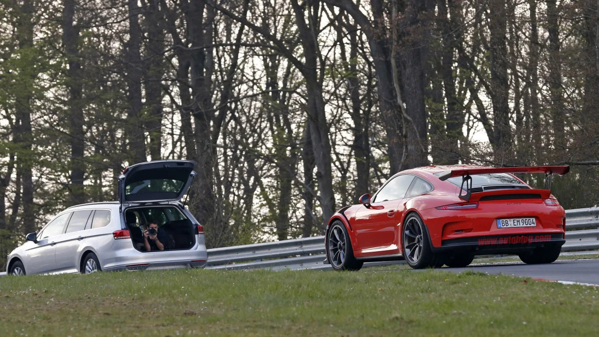 Mark Webber does promotional work in the new Porsche 911 GT3 RS at the Nuerburgring, rear view with camera car.
