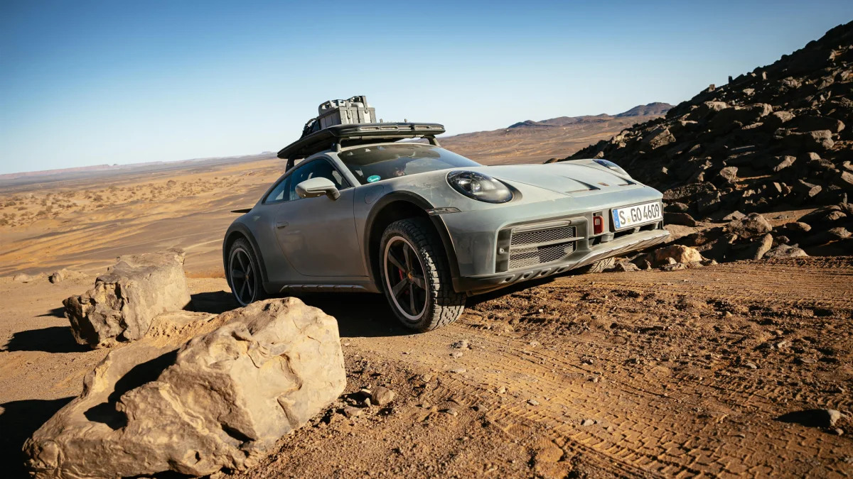 2023 Porsche 911 Dakar in Shade Green rock crawling