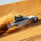 2023 Porsche 911 Dakar in Shade Green profile on dune