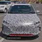 camouflaged hyundai prius-fighter spy shot front end