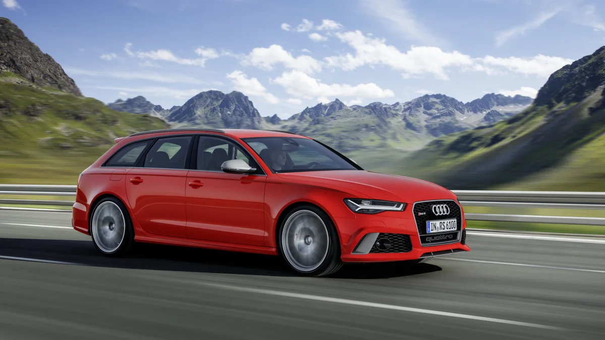 red audi rs6 avant performance on the road