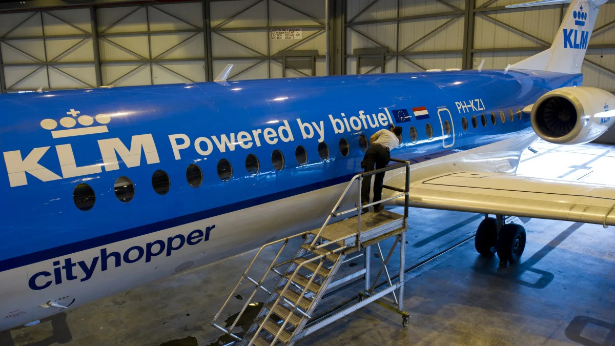 A worker prepares the KLM Fokker 70 city