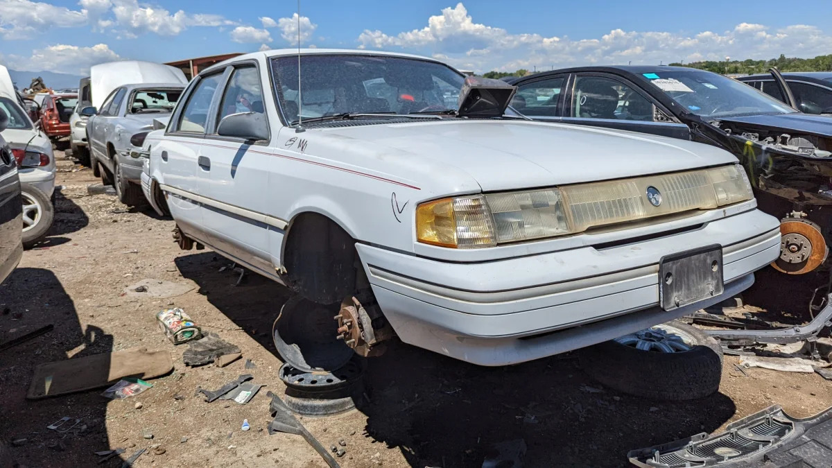 99 - 1993 Mercury Topaz in Colorado junkyard - Photo by Murilee Martin