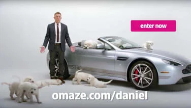 Win an Aston Martin Vantage GT Roadster from Daniel Craig and a bunch of puppies