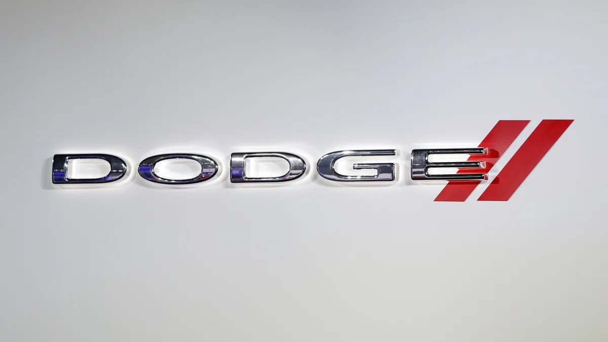 The Dodge logo is displayed at the North American International Auto Show in Detroit, Tuesday, Jan. 15, 2013. (AP Photo/Carlos Osorio)