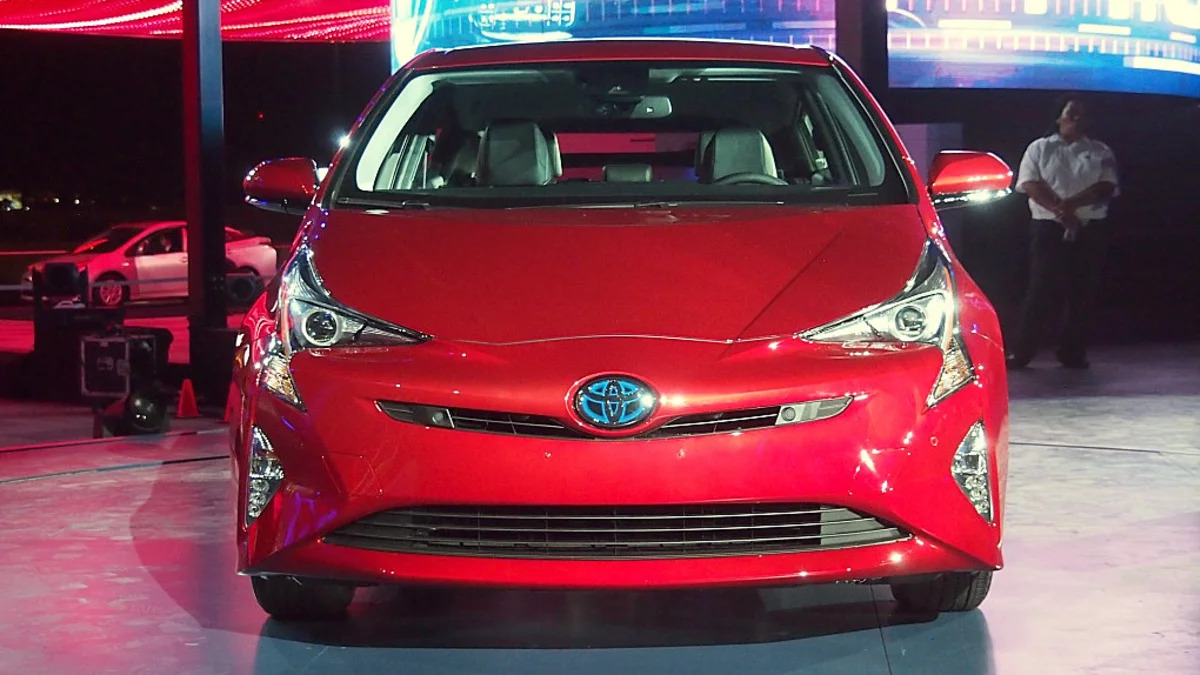2016 Toyota Prius red, at reveal event, front view