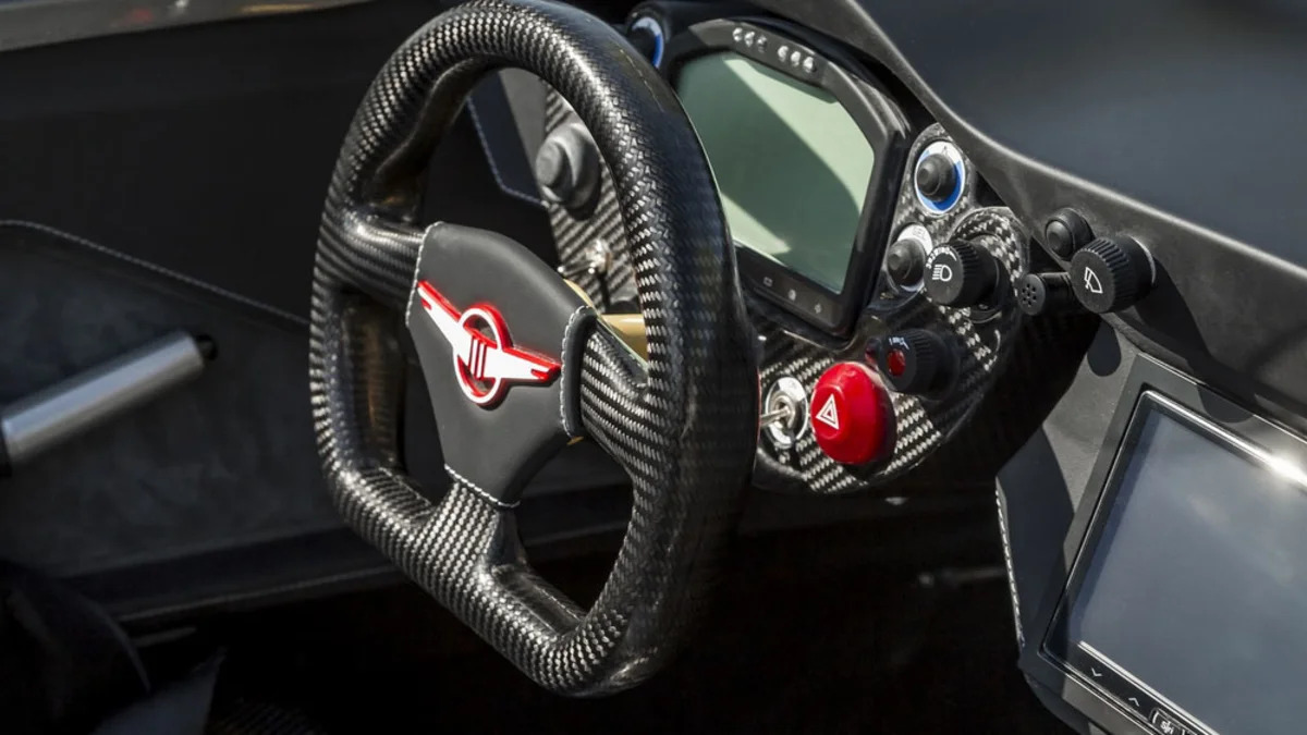 gray rezvani motors beast steering wheel