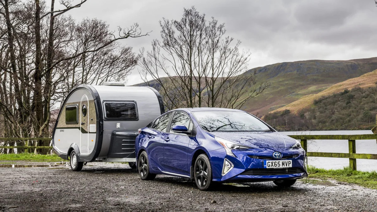 2016 Toyota Prius with trailer front 3/4 static