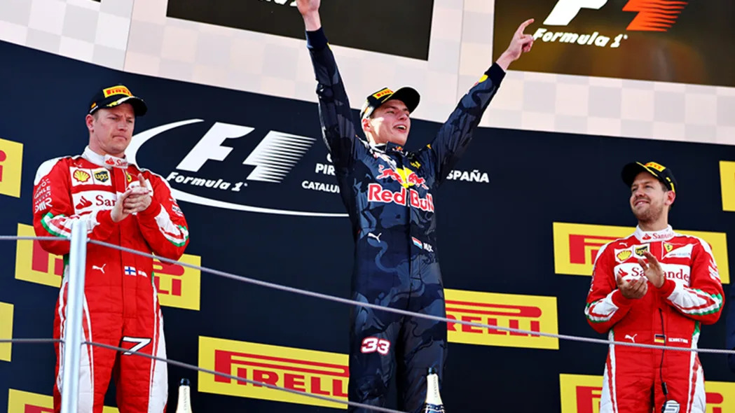 Max Verstappen of Netherlands and Red Bull Racing celebrates his first F1 win on the podium with Kimi Raikkonen of Finland and Ferrari and Sebastian Vettel of Germany and Ferrari during the Spanish Formula One Grand Prix