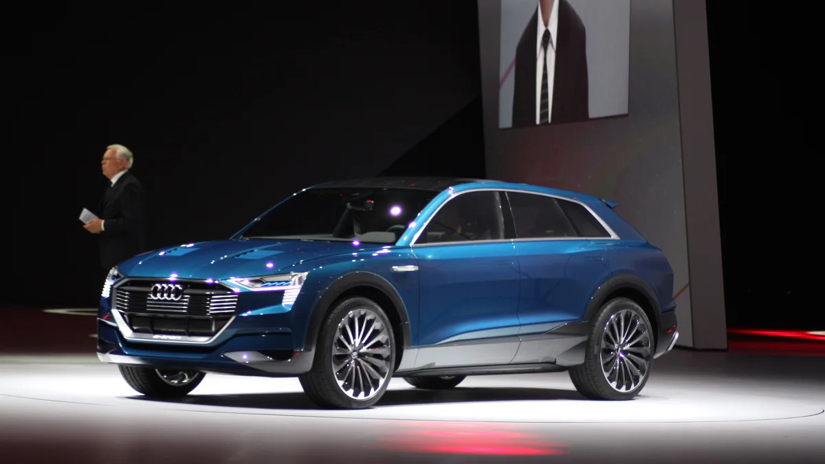 The Audi E-Tron Quattro concept is revealed to the press at Volkswagen Group Night ahead of the 2015 Frankfurt Motor Show, front three-quarter view.
