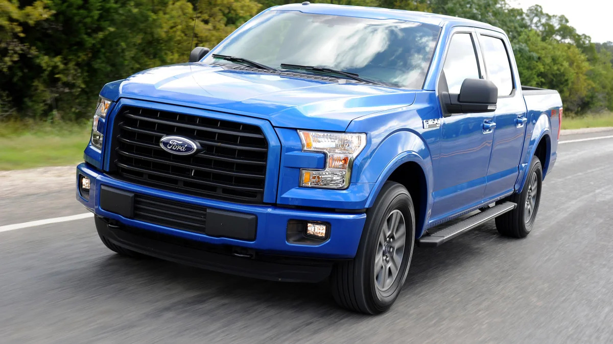 2015 Ford F-150 in blue driving
