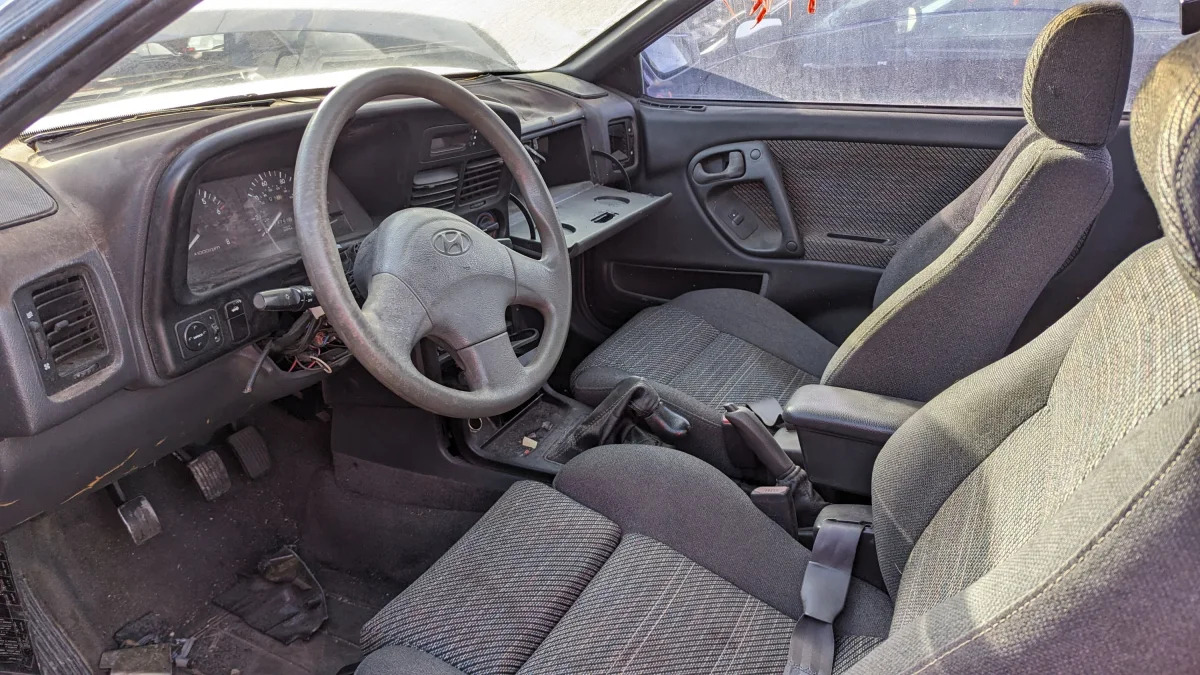 12 - 1993 Hyundai Scoupe in Colorado junkyard - photo by Murilee Martin