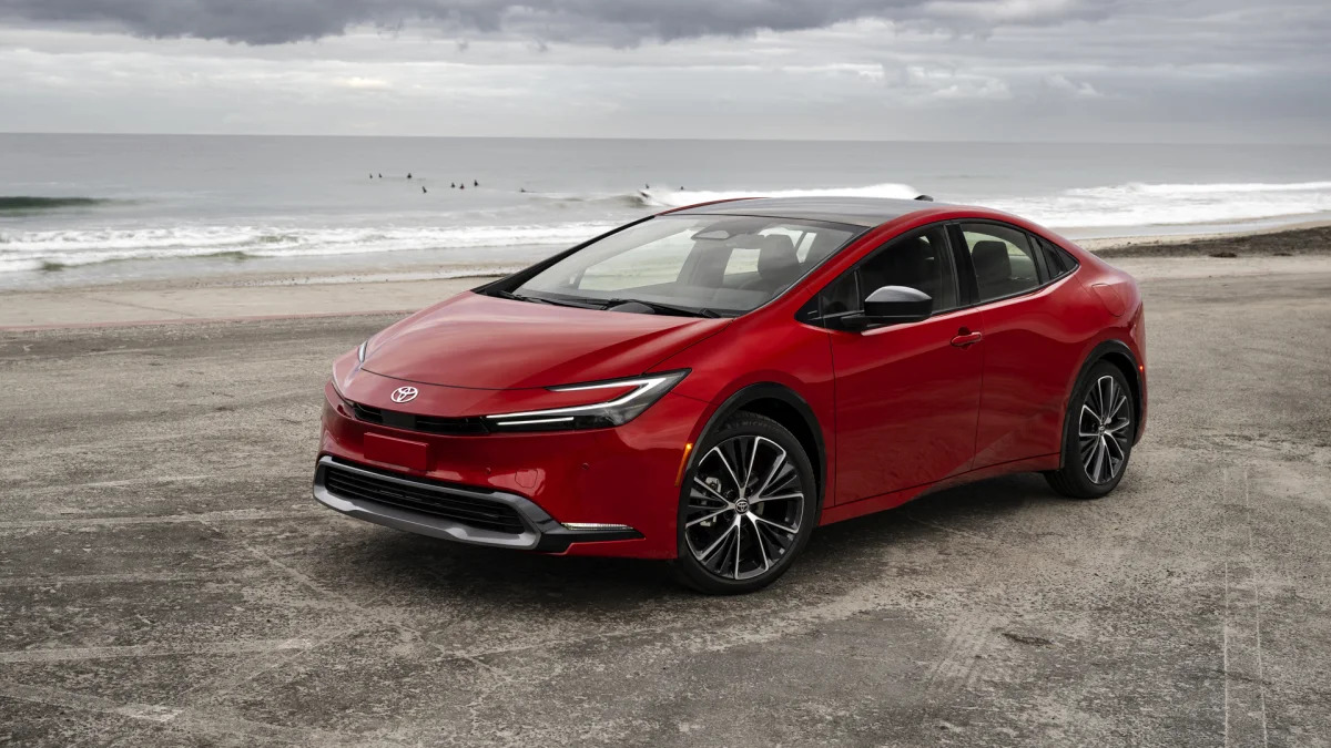 2023 Toyota Prius red front three quarter at the beach