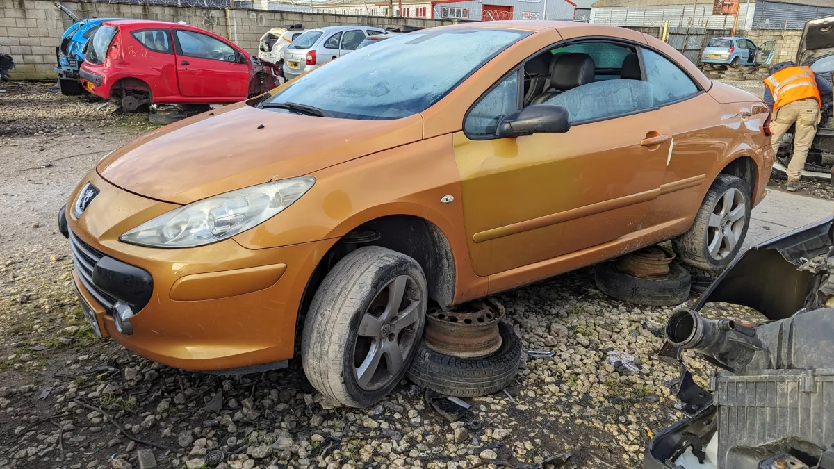 99 - 2006 Peugeot 307CC in British wrecking yard - photo by Murilee Martin