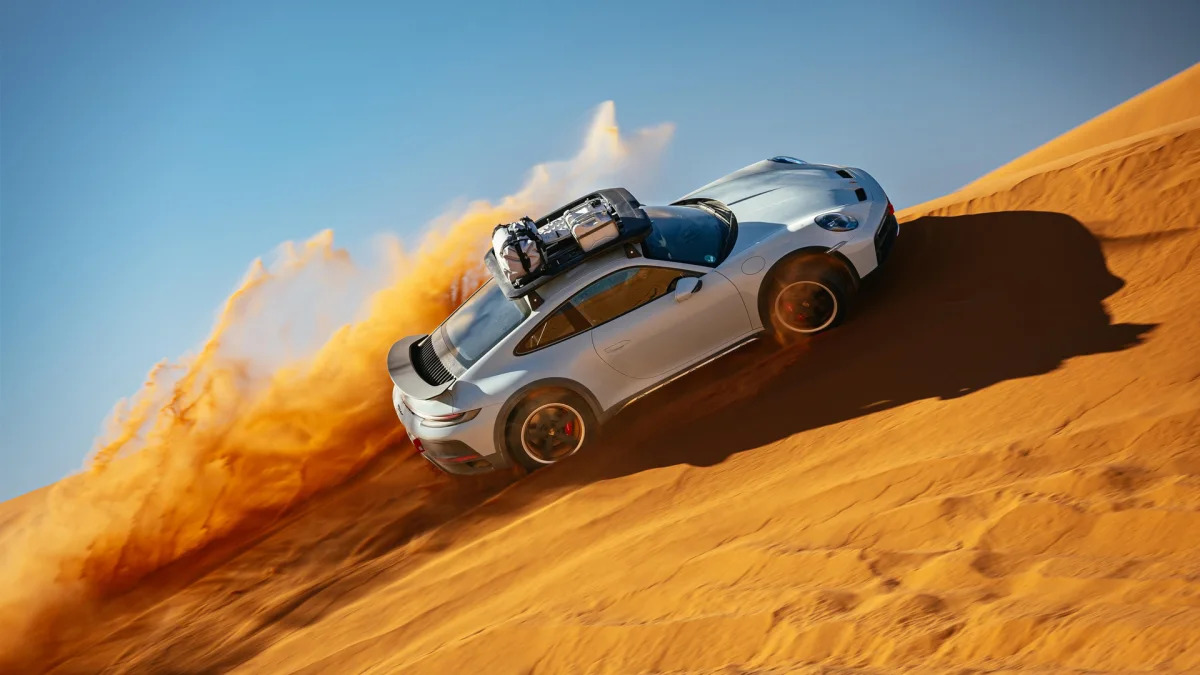 2023 Porsche 911 Dakar in Shade Green sideways on dune from above