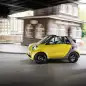 The 2016 Smart Fortwo Cabriolet, side view dynamic.