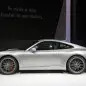 The 2016 Porsche 911 Carrera, now with a turbocharged engine in the standard car, unveiled at the Frankfurt Motor Show, side view.