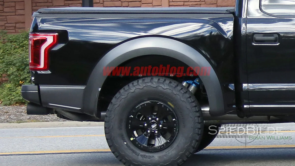 black 2017 ford f-150 raptor supercrew spy shot wheels and suspension