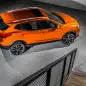 The 2017 Nissan Rogue, unveiled at the 2017 Detroit Auto Show, overhead rear three-quarter view.