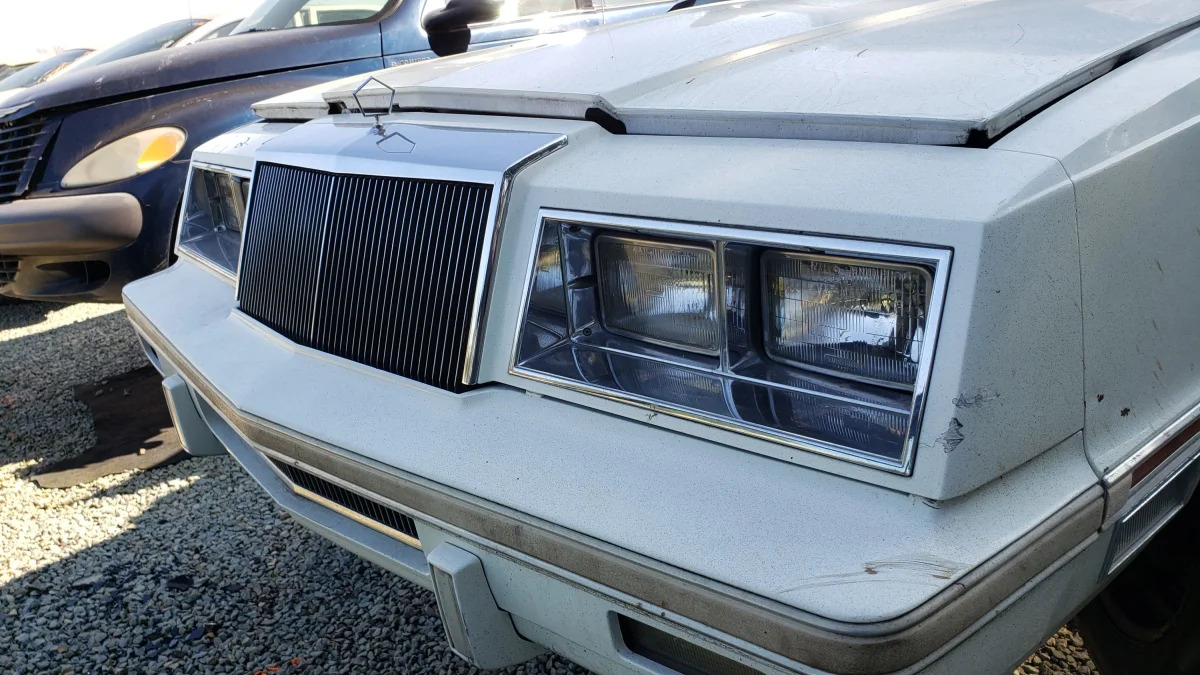 18 - 1982 Chrysler LeBaron convertible in California junkyard - photo by Murilee Martin