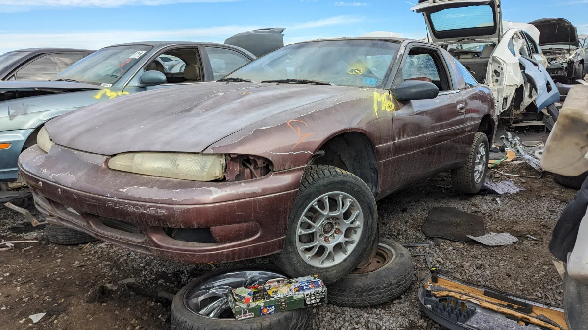 99 -1992 Plymouth Laser in Colorado wrecking yard - photo by Murilee Martin