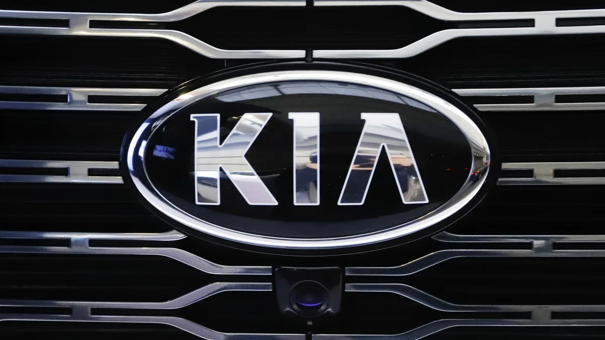 Kia logo on a vehicle grille