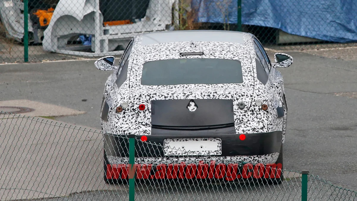 insignia buick regal opel spied fence