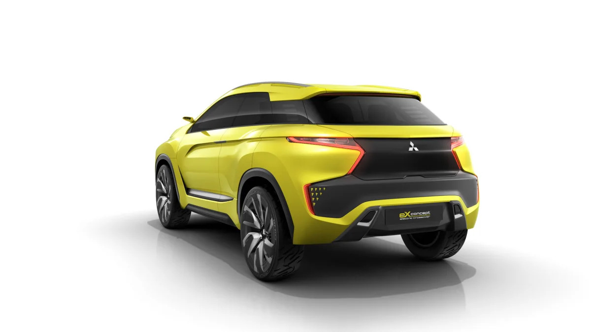 yellow mitsubishi ex concept rear three quarters white background