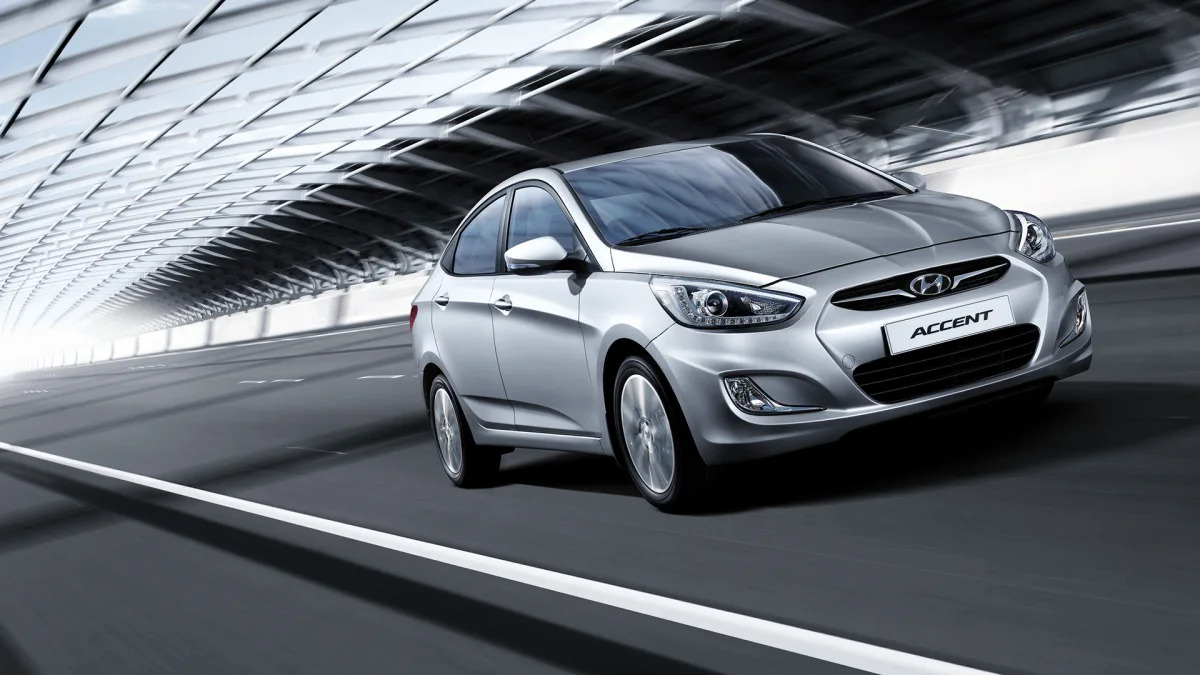 2014 Hyundai Accent in silver in a tunnel