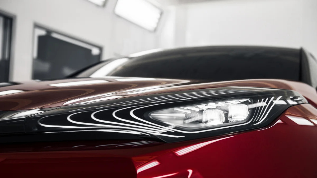 The Scion C-HR concept shown off in red for the LA Auto Show, headlight.
