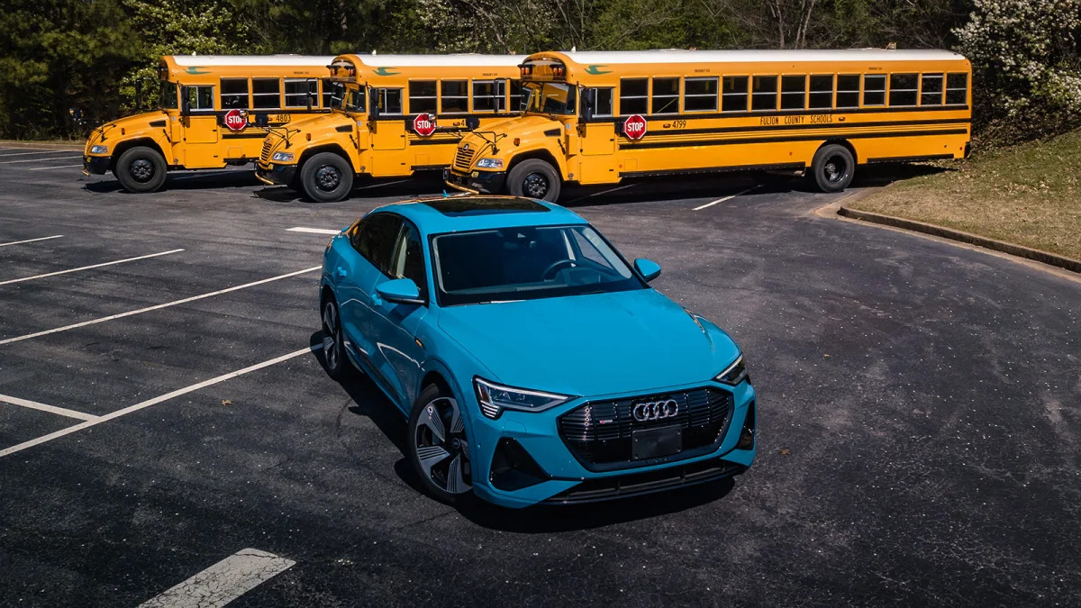 Audi E-Tron and school buses