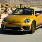 vw beetle dune convertible on the road