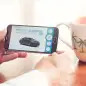 A demonstration of the Hyundai Virtual Guide, an app that uses augmented reality to display content of the owner's manual, choosing the trim.