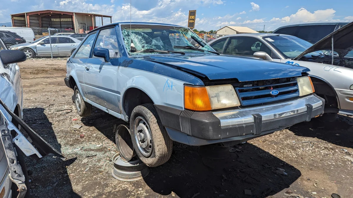 54 - 1987 Ford Escort in Colorado junkyard - photo by Murilee Martin