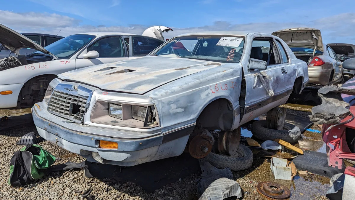57 - 1986 Ford Thunderbird Turbo Coupe in California junkyard - photo by Murilee Martin