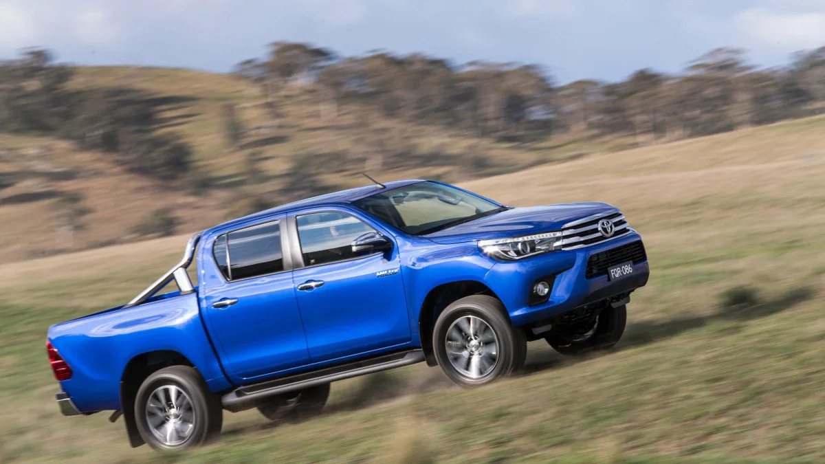 2016 Toyota HiLux pickup truck driving uphill