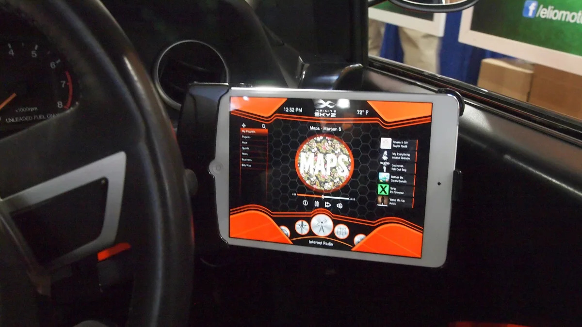 Elio Motors orange trike interior ipad 