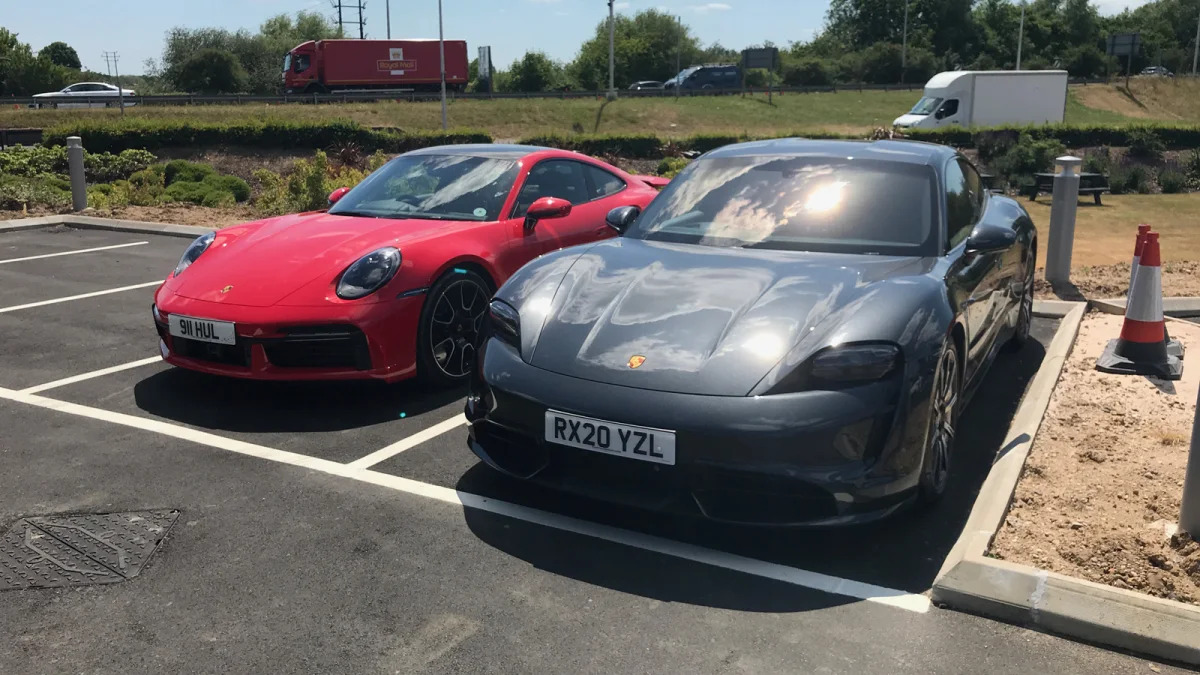 2020 Porsche Taycan Turbo and 911 Turbo front