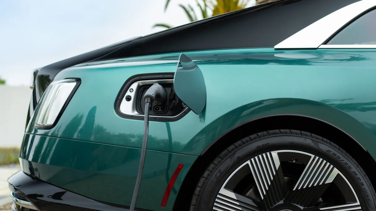 2024 Rolls-Royce Spectre in Imperial Jade charging